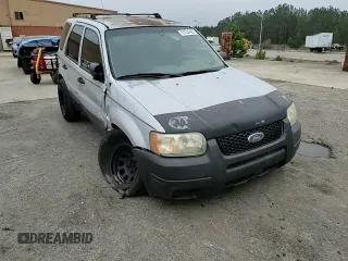 2003 Ford Escape XLS Popular with VIN 1FMYU02173KB43156, listed as a Copart auction lot 51534495 with 266,600 mi miles and Salvage title. Bid and sale history available at DreamBid. Image 10.