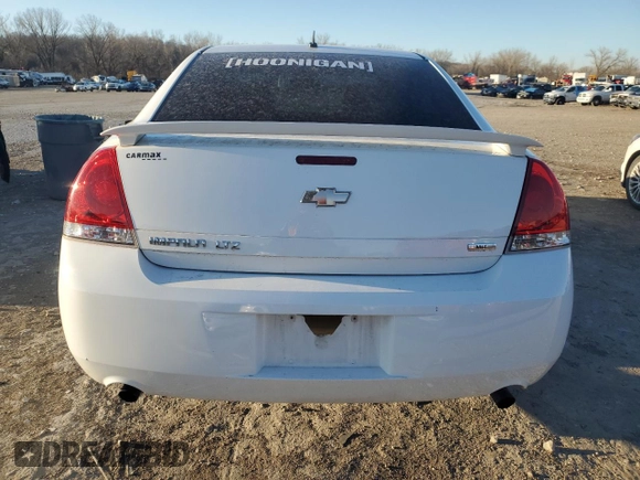 2014 Chevrolet Impala LTZ with VIN 2G1WC5E36E1151883, listed as a Copart auction lot 49337525 with 172,803 mi miles and Salvage Title. Bid and sale history available at DreamBid. Image 6.