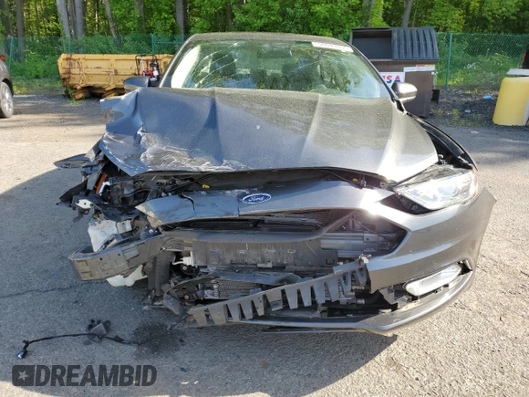 2018 Ford Fusion SE z VIN 3FA6P0LU9JR242443, wystawiony jako Copart lot #58049355 z przebiegiem 123 990 mil mil oraz Szkoda całkowita • Salvage title. Historia ofert i sprzedaży dostępna na DreamBid. Obrazek 5.