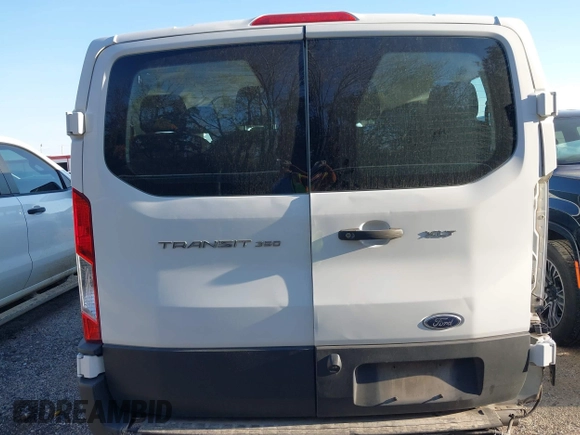 2021 Ford Transit Passenger XL z VIN 1FBAX2Y89MKA49850, wystawiony jako IAAI lot #41602893 z przebiegiem 74 248 mil mil oraz . Historia ofert i sprzedaży dostępna na DreamBid. Obrazek 16.