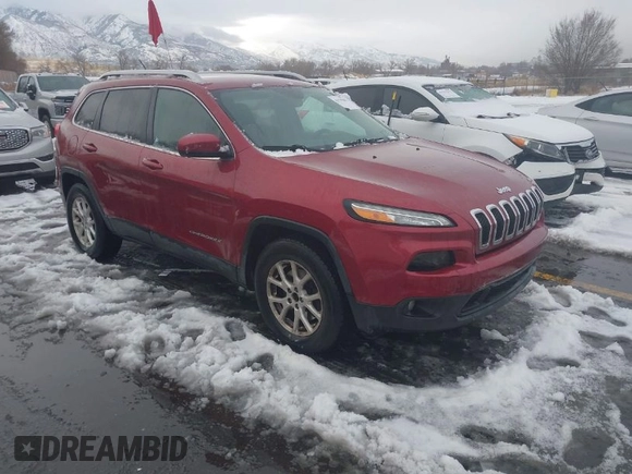 2014 Jeep Cherokee Latitude with VIN 1C4PJMCB8EW166853, listed as a IAAI auction lot 41579386 with 251,683 mi miles and . Bid and sale history available at DreamBid. Image 1.
