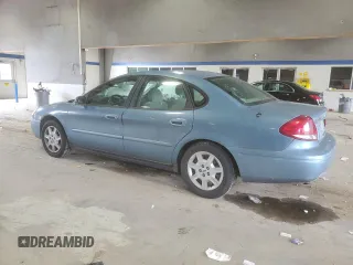 2007 Ford Taurus SE with VIN 1FAFP53U17A215432, listed as a Copart auction lot 64029215 with 121,190 mi miles and Salvage title. Bid and sale history available at DreamBid. Image 2.