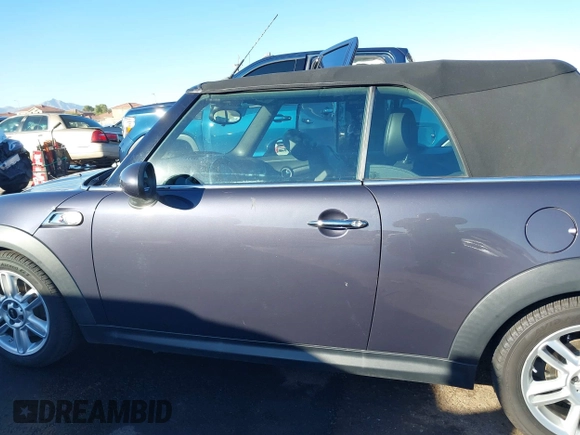 2012 MINI Convertible S with VIN WMWZP3C53CT550336, listed as a IAAI auction lot 40857283 with 51,111 mi miles and . Bid and sale history available at DreamBid. Image 15.