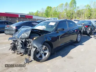 2012 Dodge Charger SE with VIN 2C3CDXBG7CH259867, listed as a IAAI auction lot 42046084 with 240,558 mi miles and . Bid and sale history available at DreamBid. Image 16.