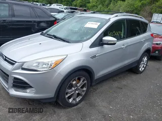 2015 Ford Escape Titanium z VIN 1FMCU9J91FUA85771, wystawiony jako IAAI lot #42306986 z przebiegiem 135 787 mil mil oraz . Historia ofert i sprzedaży dostępna na DreamBid. Obrazek 2.