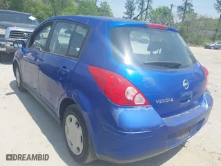 2009 Nissan Versa 1.8 SL with VIN 3N1BC13E69L479086, listed as a IAAI auction lot 42037231 with 180,076 mi miles. Bid and sale history available at carsss.com. Image 3.
