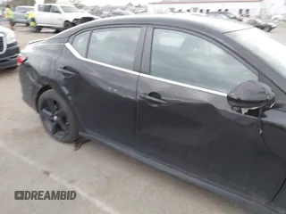2022 Nissan Sentra SR z VIN 3N1AB8DV1NY231461, wystawiony jako IAAI lot #41842739 z przebiegiem 58 709 mil mil oraz . Historia ofert i sprzedaży dostępna na DreamBid. Obrazek 13.