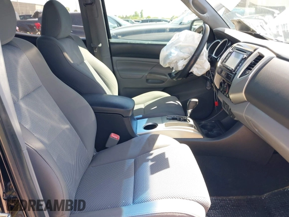 2014 Toyota Tacoma PreRunner with VIN 3TMJU4GN0EM160403, listed as a IAAI auction lot 41979894 with 169,941 mi miles. Bid and sale history available at carsss.com. Image 5.