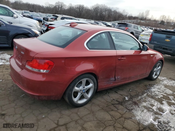 2011 BMW 1 Series 128i with VIN WBAUP9C52BVL89574, listed as a Copart auction lot 43713545 with 121,819 mi miles and Salvage Title. Bid and sale history available at carsss.com. Image 3.