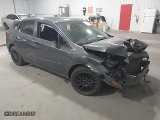 2018 Subaru Impreza with VIN 4S3GTAA65J3713216, listed as a IAAI auction lot 40963294 with 94,176 mi miles. Bid and sale history available at carsss.com. Image 1.