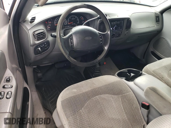 2000 Ford F-150 XL with VIN 2FTRX08L2YCA22507, listed as a Copart auction lot 55390075 with 197,785 mi miles and Salvage title. Bid and sale history available at DreamBid. Image 8.