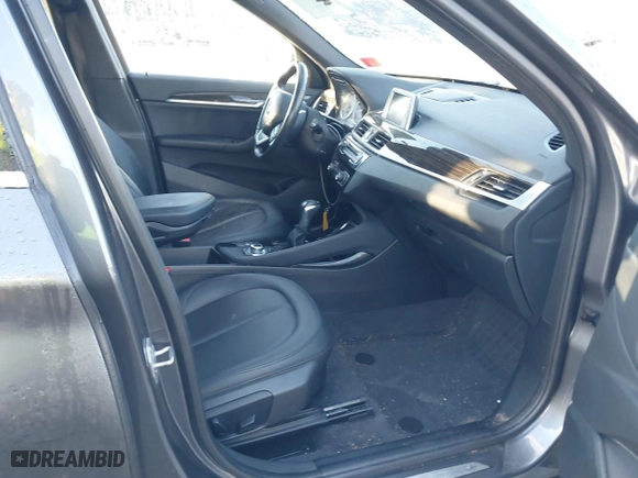 2016 BMW X1 xDrive28i with VIN WBXHT3C30GP881837, listed as a IAAI auction lot 41117389 with 84,157 mi miles. Bid and sale history available at carsss.com. Image 5.