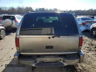 2000 Oldsmobile Bravada z VIN 1GHDT13WXY2255649, wystawiony jako Copart lot #80021214 z przebiegiem Nie podano mil oraz Szkody całkowita. Historia ofert i sprzedaży dostępna na DreamBid. Obrazek 6.