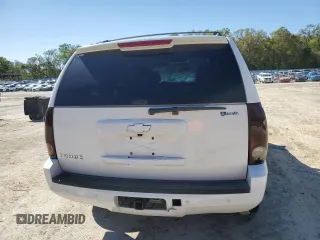2014 Chevrolet Tahoe LT with VIN 1GNSCBE08ER192587, listed as a Copart auction lot 49216975 with 178,595 mi miles and Salvage title. Bid and sale history available at DreamBid. Image 6.