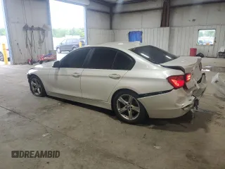2013 BMW 3 Series 328i xDrive with VIN WBA3B3C54DF536837, listed as a Copart auction lot 62305215 with 289,839 mi miles and Salvage title. Bid and sale history available at DreamBid. Image 2.
