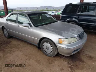 1997 Acura RL Premium с VIN JH4KA9650VC004602, выставлен на аукционе IAAI как лот 42739439 с пробегом Не указан миль и . История ставок и продаж доступна на DreamBid. Изображение 1.