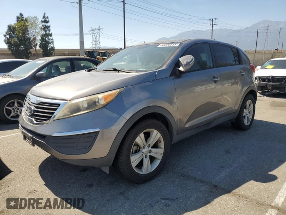 2012 Kia Sportage LX with VIN KNDPB3A22C7286908, listed as a Copart auction lot 58220115 with 171,114 mi miles and Clean title. Bid and sale history available at DreamBid. Image 1.