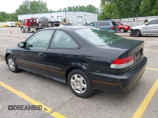 1999 Honda Civic EX z VIN 1HGEJ8241XL068738, wystawiony jako IAAI lot #42568778 z przebiegiem 202 590 mil mil oraz . Historia ofert i sprzedaży dostępna na DreamBid. Obrazek 3.