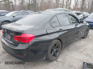 2018 BMW 3 Series 320i with VIN WBA8E1G51JNU91319, listed as a IAAI auction lot 41690084 with 67,609 mi miles. Bid and sale history available at carsss.com. Image 4.