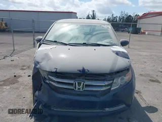2015 Honda Odyssey EX-L z VIN 5FNRL5H65FB090177, wystawiony jako IAAI lot #41575419 z przebiegiem 128 582 mil mil oraz . Historia ofert i sprzedaży dostępna na DreamBid. Obrazek 12.