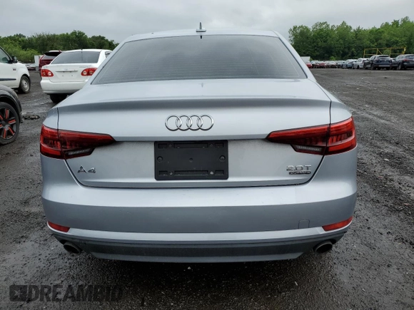 2017 Audi A4 Premium z VIN WAUANAF46HN027236, wystawiony jako Copart lot #60141515 z przebiegiem 103 700 mil mil oraz Szkoda całkowita • Salvage title. Historia ofert i sprzedaży dostępna na DreamBid. Obrazek 6.