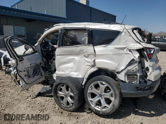 2019 Ford Escape Titanium с VIN 1FMCU9J93KUB60965, выставлен на аукционе Copart как лот 58363185 с пробегом Не указан миль и Списание • Salvage title. История ставок и продаж доступна на DreamBid. Изображение 2.