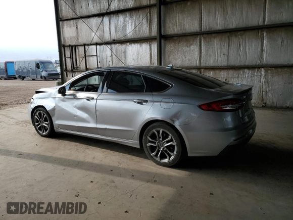 2020 Ford Fusion Titanium with VIN 3FA6P0RU5LR141507, listed as a Copart auction lot 64798205 with 113,216 mi miles and Salvage title. Bid and sale history available at DreamBid. Image 2.