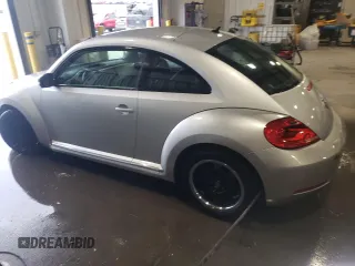 2012 Volkswagen Beetle 2.5L PZEV with VIN 3VWJP7AT8CM603469, listed as a Copart auction lot 56371425 with 97,575 mi miles and Clean title. Bid and sale history available at DreamBid. Image 2.