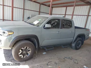 2023 Toyota Tacoma 4WD SR with VIN 3TMCZ5ANXPM613857, listed as a IAAI auction lot 41771957 with 76,232 mi miles. Bid and sale history available at carsss.com. Image 14.