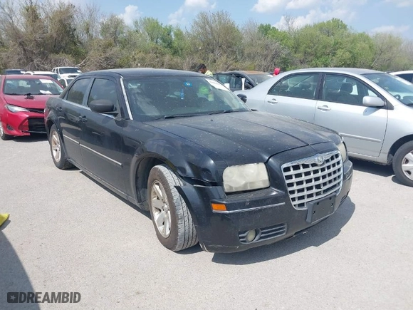 2006 Chrysler 300 Touring with VIN 2C3KA53G66H212129, listed as a IAAI auction lot 41868973 with 248,340 mi miles. Bid and sale history available at carsss.com. Image 1.