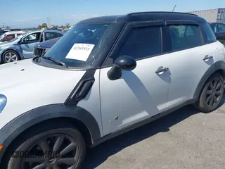 2012 MINI Countryman S with VIN WMWZC5C54CWM11869, listed as a IAAI auction lot 42265935 with 100,102 mi miles and . Bid and sale history available at DreamBid. Image 6.