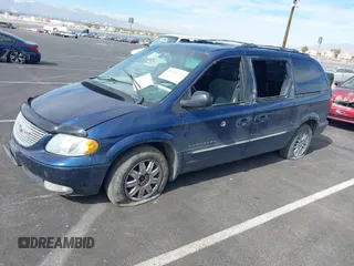 2001 Chrysler Town & Country Limited with VIN 2C8GP64L81R128221, listed as a IAAI auction lot 41630779 with 275,215 mi miles. Bid and sale history available at carsss.com. Image 12.