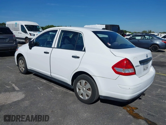 2010 Nissan Versa 1.6 with VIN 3N1CC1AP2AL377412, listed as a IAAI auction lot 41420948 with 127,643 mi miles. Bid and sale history available at carsss.com. Image 3.