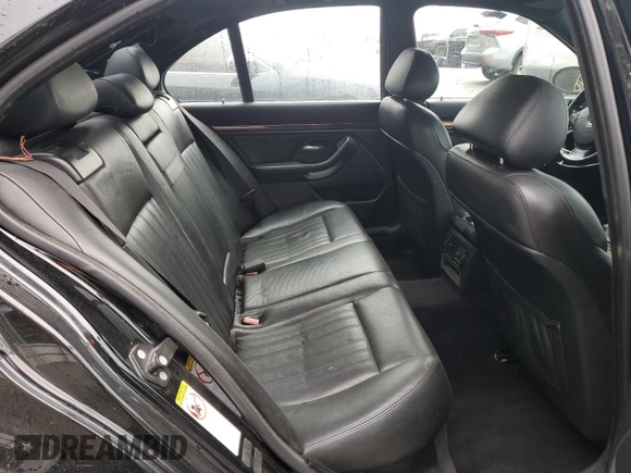 2000 BMW M5 z VIN WBSDE9345YBZ94319, wystawiony jako Copart lot #49945325 z przebiegiem 146 571 mil mil oraz Czysty tytuł • Clean title. Historia ofert i sprzedaży dostępna na DreamBid. Obrazek 10.