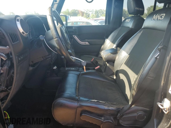2012 Jeep Wrangler Unlimited Call of Duty MW3 with VIN 1C4BJWFG2CL191940, listed as a Copart auction lot 65955465 with 108,033 mi miles and Clean title. Bid and sale history available at DreamBid. Image 7.
