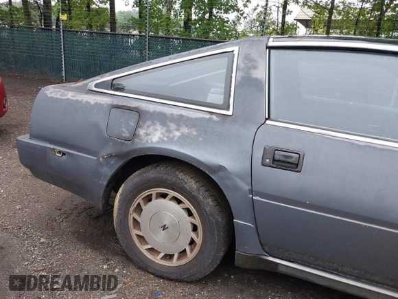 1987 Nissan 300ZX z VIN JN1HZ14S6HX217908, wystawiony jako IAAI lot #42271417 z przebiegiem 195 466 mil mil oraz . Historia ofert i sprzedaży dostępna na DreamBid. Obrazek 6.