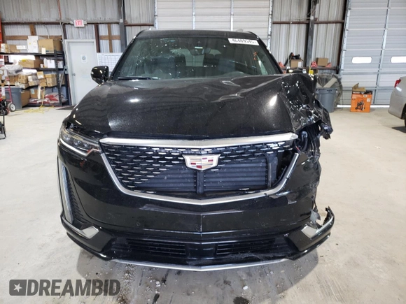 2023 Cadillac XT6 AWD Premium Luxury with VIN 1GYKPFRS3PZ121942, listed as a Copart auction lot 46489545 with 35,453 mi miles and Salvage Title. Bid and sale history available at DreamBid. Image 5.