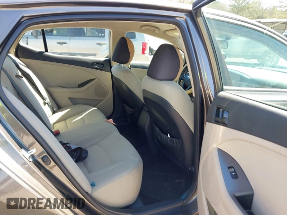 2013 Kia Optima LX with VIN 5XXGM4A77DG157034, listed as a IAAI auction lot 41870513 with 142,433 mi miles and . Bid and sale history available at carsss.com. Image 8.