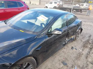 2022 Tesla Model S with VIN 5YJSA1E54NF476793, listed as a IAAI auction lot 41204340 with 27,382 mi miles. Bid and sale history available at carsss.com. Image 6.