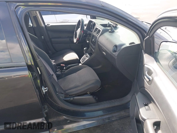 2010 Dodge Caliber SXT with VIN 1B3CB4HAXAD651644, listed as a IAAI auction lot 42173361 with 195,480 mi miles and . Bid and sale history available at DreamBid. Image 5.