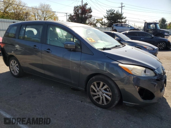 2012 Mazda 5 Sport with VIN JM1CW2BL4C0139163, listed as a Copart auction lot 75521794 with 211,595 mi miles and Salvage Title. Bid and sale history available at DreamBid. Image 4.
