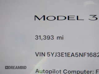 2022 Tesla Model 3 with VIN 5YJ3E1EA5NF168201, listed as a IAAI auction lot 41855273 with 31,393 mi miles and . Bid and sale history available at DreamBid. Image 7.