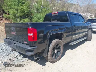 2015 GMC Sierra 1500 SLT with VIN 3GTU2VEJ8FG318480, listed as a IAAI auction lot 42075388 with 143,156 mi miles and . Bid and sale history available at DreamBid. Image 4.