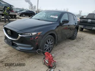2018 Mazda CX-5 Touring with VIN JM3KFBCM2J0427786, listed as a Copart auction lot 45539345 with 62,989 mi miles and Salvage Title. Bid and sale history available at carsss.com. Image 1.