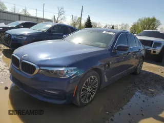 2018 BMW 5 Series 530e xDrive with VIN WBAJB1C58JB084700, listed as a Copart auction lot 55204775 with 156,017 mi miles and Clean title. Bid and sale history available at DreamBid. Image 1.