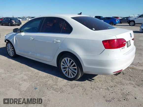 2012 Volkswagen Jetta Sedan SEL w/Sunroof with VIN 3VWLX7AJ4CM323376, listed as a IAAI auction lot 41722977 with 282,535 mi miles. Bid and sale history available at carsss.com. Image 3.
