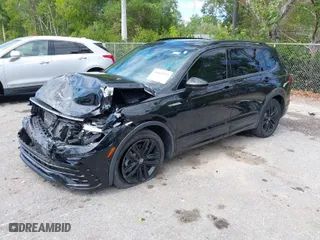 2022 Volkswagen Tiguan SE R-Line Black with VIN 3VVCB7AX9NM054351, listed as a IAAI auction lot 41665235 with 30,971 mi miles. Bid and sale history available at carsss.com. Image 2.