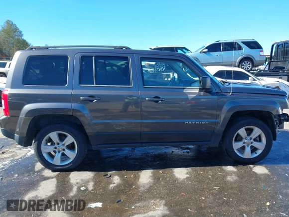 2014 Jeep Patriot Latitude with VIN 1C4NJRFB3ED886007, listed as a IAAI auction lot 41285963 with 127,007 mi miles and . Bid and sale history available at DreamBid. Image 14.