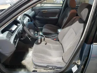 2000 Toyota Camry CE z VIN 4T1BG22K7YU744080, wystawiony jako Copart lot #56675105 z przebiegiem 226 154 mil mil oraz Szkoda całkowita • Salvage title. Historia ofert i sprzedaży dostępna na DreamBid. Obrazek 7.