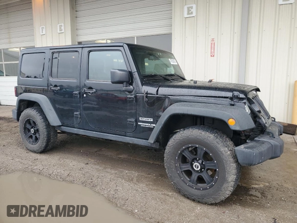 2014 Jeep Wrangler Unlimited Sport with VIN 1C4BJWDG2EL319714, listed as a Copart auction lot 47924575 with 129,294 mi miles and Salvage Title. Bid and sale history available at DreamBid. Image 4.